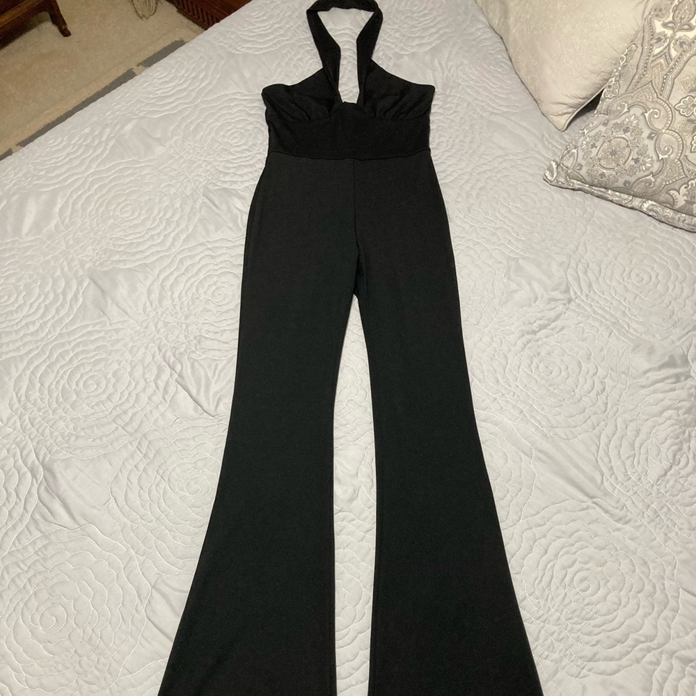 Black Halter Neck Sleeveless Backless Body Hugging Flared Leg Jumpsuit by Adika